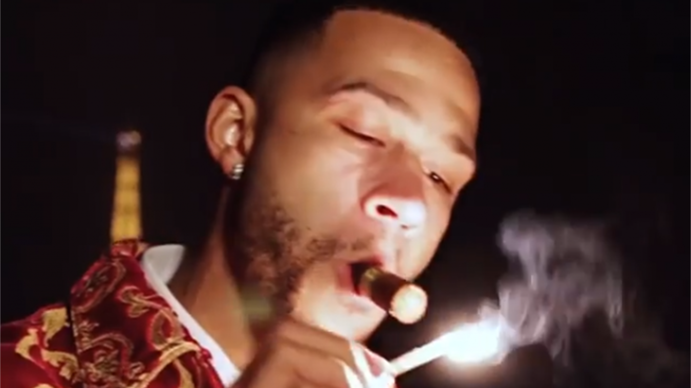 Memphis Depay wears dodgy jacket and smokes cigar as he dedicates