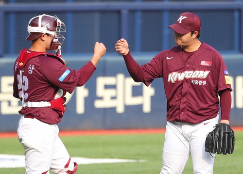 12th Oct, 2020. LG Twins' Park Yong-taik LG Twins' Park Yong-taik (L)  celebrates after hitting a single against the NC Dinos at a Korea Baseball  Organization league match at Jamsil Baseball Stadium