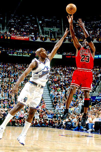 Michael Jordan's iconic turnaround fadeaway jump shot - how'd he