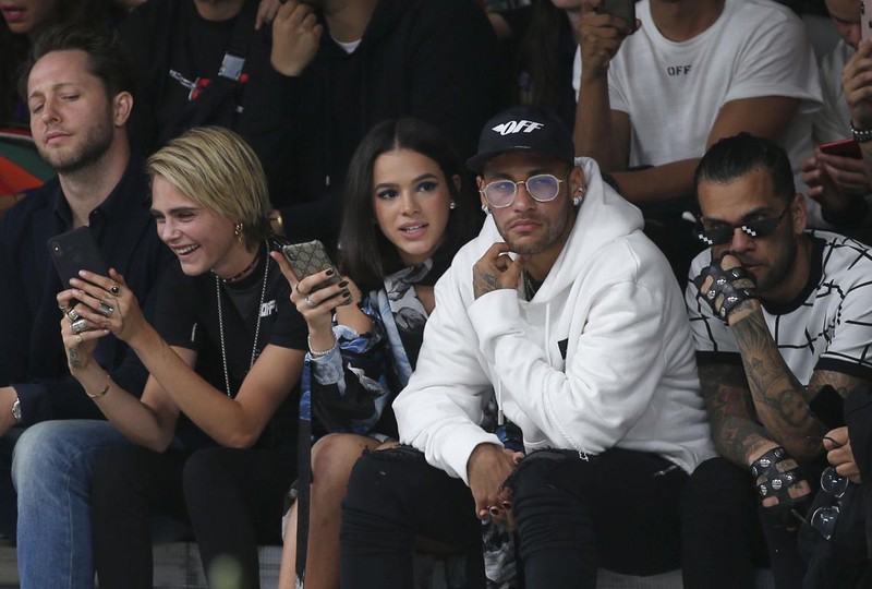 PSG's Neymar and Dani Alves attend Paris Fashion Week